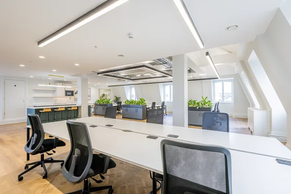 Desks over wood-effect LVT under the roof lights