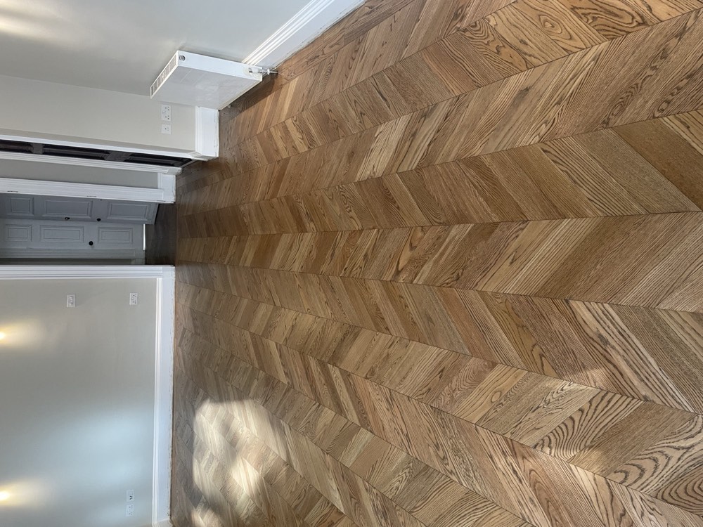 Chevron parquet flooring fitted in a home