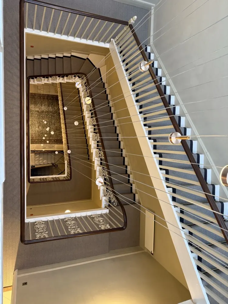 A stair runner fitted by Guild Floors on a period staircase